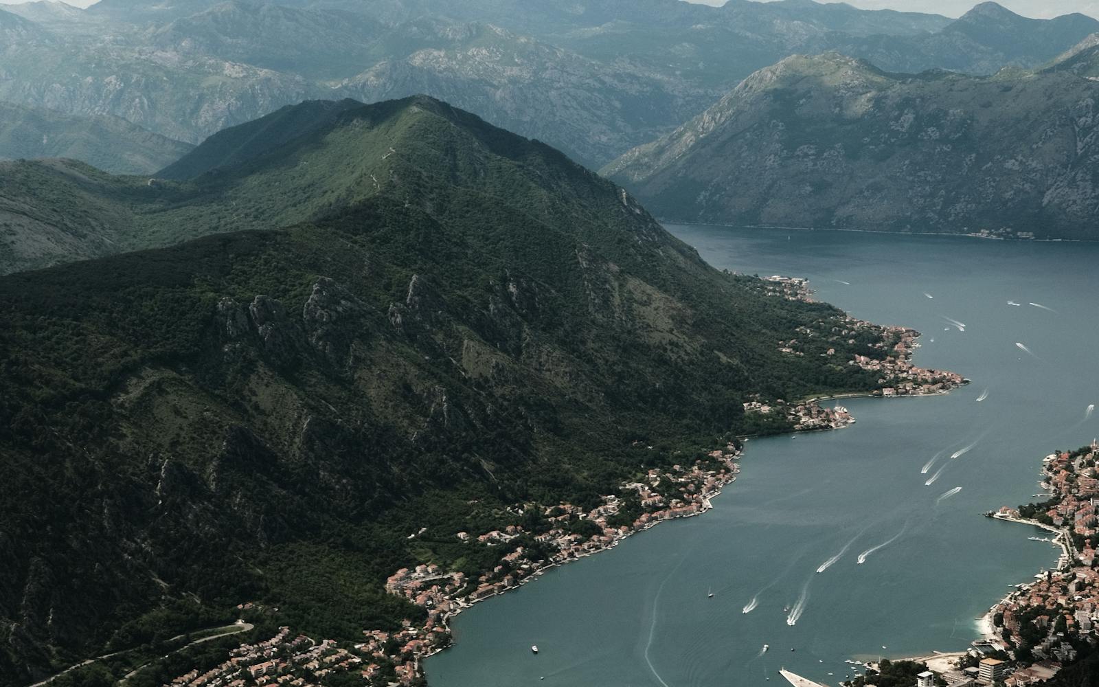 Mountain road winding through the Lovcen foothills above Kotor bay
