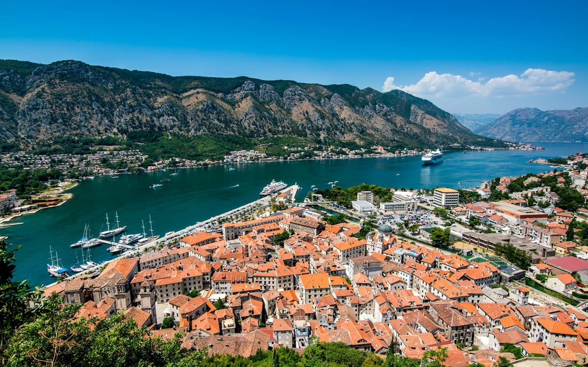 Aerial view of Kotor's walled Old Town and its waterfront
