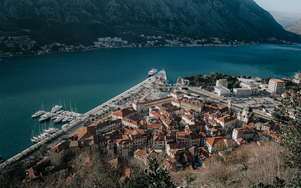 Aerial view of a Montenegrin city beside the water near Podgorica